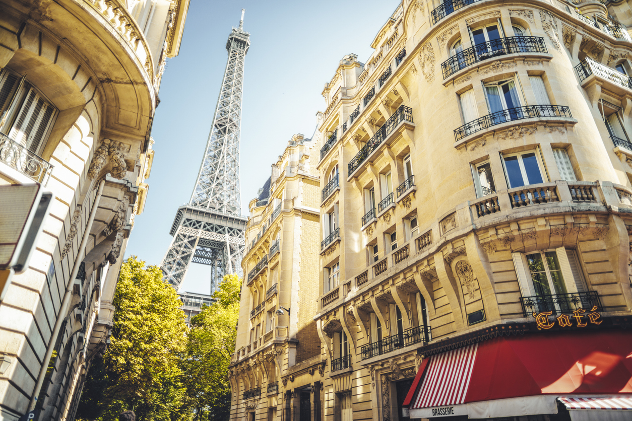 Paris, France — Eiffel Tower framed by Haussmann buildings